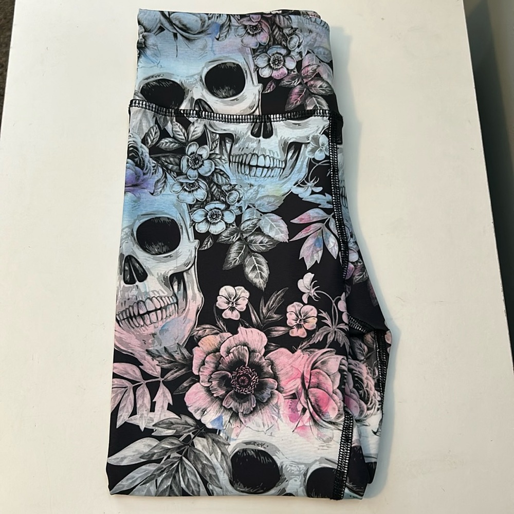 Evolution and creation skull floral leggings